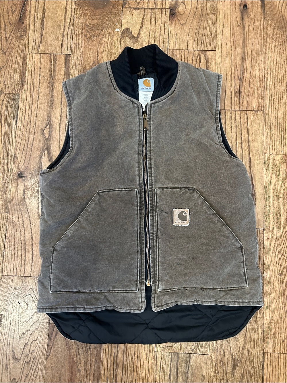 Vintage Carhartt V02 Quilt-Lined Duck Vest in the color Chestnut